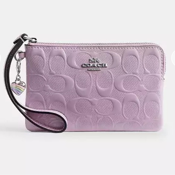 Coach Handbags - Coach Light Purple Embossed Wristlet